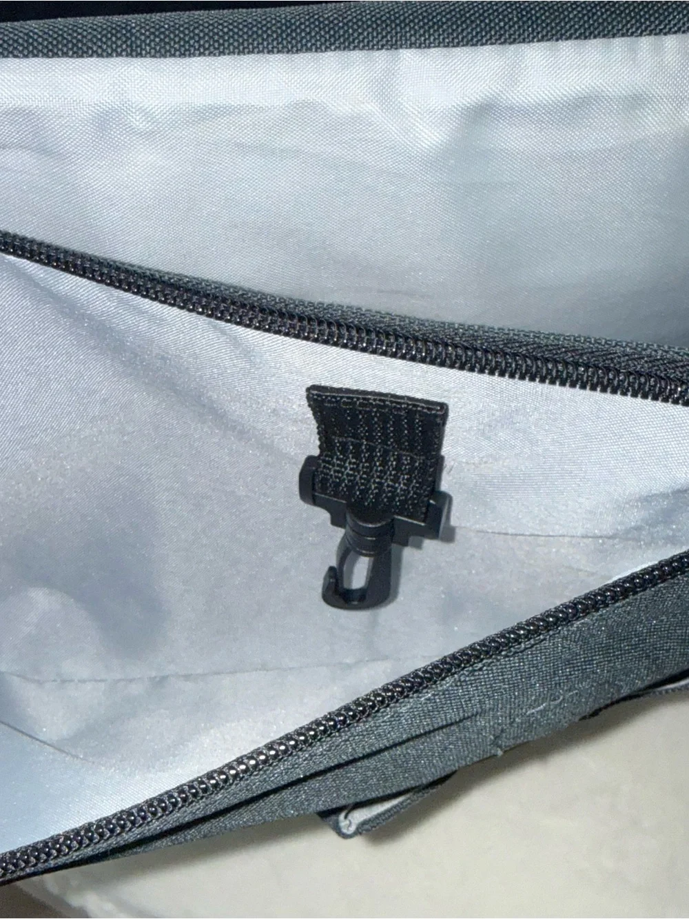 Skip Hop Black Messenger Bag with Light Blue Piping